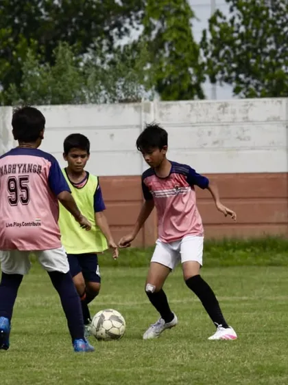 The heat of competition during our Intra Academy Football Championship. Here, our players learn to apply their skills in real match situations, developing crucial game sense and tactical awareness on the field.