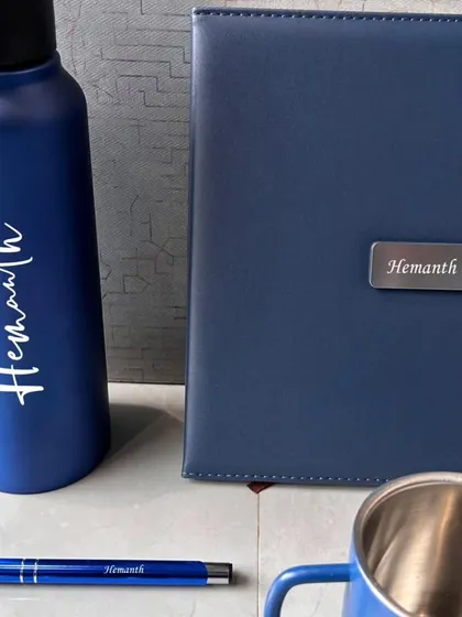 Personalization is key. Beyond company logos, I can engrave individual names on each item, like this "Hemanth" set in a striking blue. It makes every gift feel personal and valued.