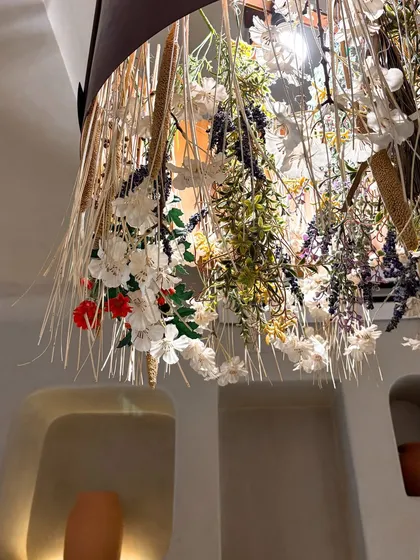 The decor at La Croûte is as beautiful as their food. I captured this shot of their floral chandelier to set the scene and convey the charming, whimsical atmosphere of the cafe.