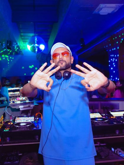 A confident pose at the start of the night. You know you're in for a good time.