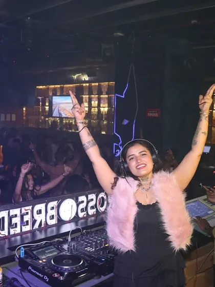 Another shot of me with my hands up, celebrating with the crowd.