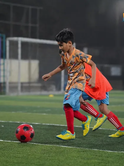 A player practices his dribbling, showing the passion and determination we see in every training session.