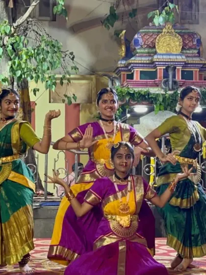 My younger dancers in their vibrant costumes for the Karaga festival performance. Their enthusiasm is infectious.