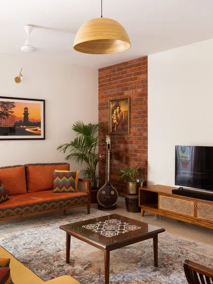 A complete living room setting featuring our Ramaniyam collection, which we created through a close collaboration with our client. This space showcases how we can customize an entire suite of furniture, including the sofa, center table, and TV unit, to reflect a client's personal story and cultural roots.