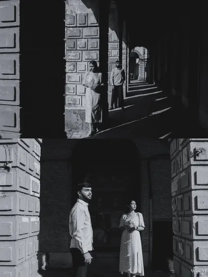 A dramatic black and white diptych using shadows and light. The architectural setting in Mumbai creates strong lines and a cinematic feel for this artistic pre-wedding shot.