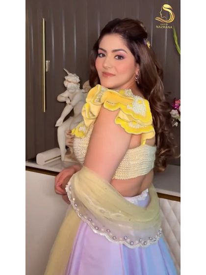 My bride looking like she stepped out of a fairytale with her whimsical floral hairstyle.