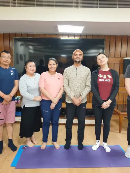 A group of international students with their instructor. We foster a supportive learning environment where students feel comfortable asking questions and deepening their understanding.