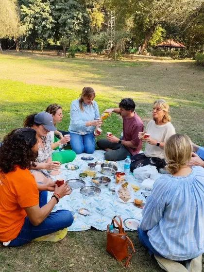 A perfect pause on a perfect day. Our tours are about slow travel, which means taking time to relax and soak it all in. We love setting up these picnics with reusable utensils in Delhi's beautiful green spaces, sharing snacks and stories with our fellow riders.