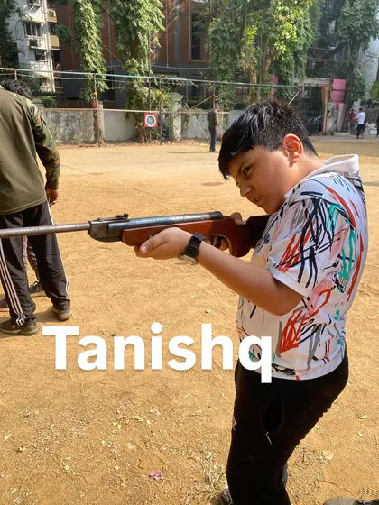 Tanishq focuses intently on his target, showing the discipline that marksmanship teaches.