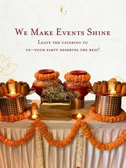 A simple yet elegant table setup for a festive celebration. The earthen pots and marigold garlands add a touch of traditional Indian charm.