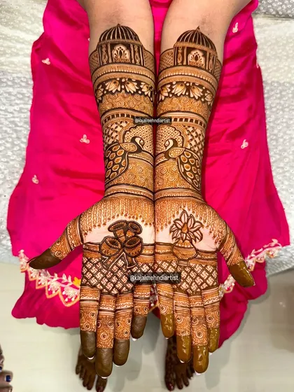 A symmetrical view of the bridal design with peacocks and dholak motifs.