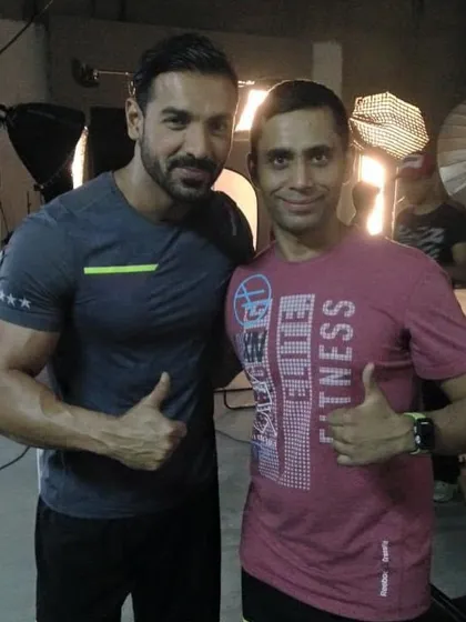 On set with the incredibly fit John Abraham. His commitment to a healthy lifestyle is second to none.