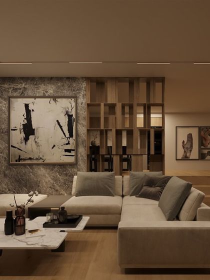 A contemporary living space is elegantly lit by our ceiling-flushed 'FLIX-C TW' track lights. The system forms a clean, geometric outline on the ceiling, providing uniform ambient light that enhances the room's modern architecture and luxurious feel.