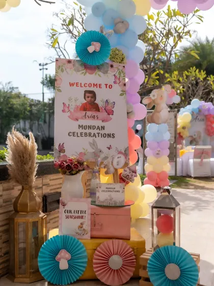 The welcome station for Aria's Mundan celebration. The rabbit-themed decor in soft pastel colors, along with a personalized welcome sign, created a sweet and gentle atmosphere.
