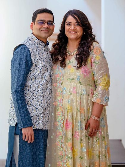 A formal portrait of the expecting couple, dressed in elegant traditional wear. I can tailor the style of the shoot to match your vision, from casual to formal.