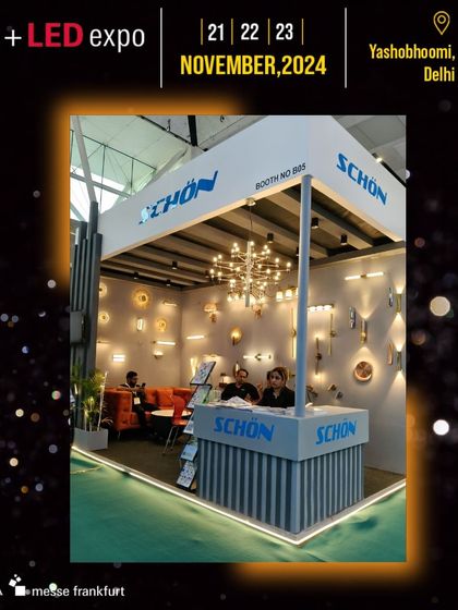 The SCHON booth creates a warm, inviting atmosphere to display its collection of decorative and architectural lighting.