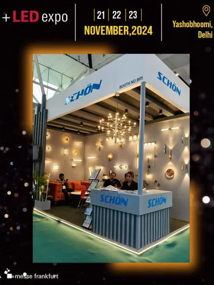 The SCHON booth creates a warm, inviting atmosphere to display its collection of decorative and architectural lighting.