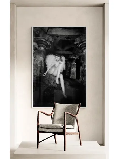 Always excited to see my art up at a client's space. This image shows one of my fine art prints, "Fallen Angel," displayed in a beautiful interior.