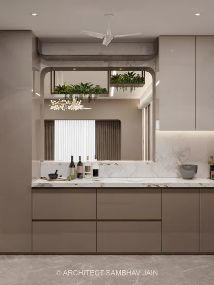 This beige-toned minimalist kitchen embodies quiet luxury and functional elegance. Soft matte cabinetry in warm beige hues creates a seamless and calming canvas, while the backsplash, clad in pristine white marble, adds a timeless and upscale dimension.
