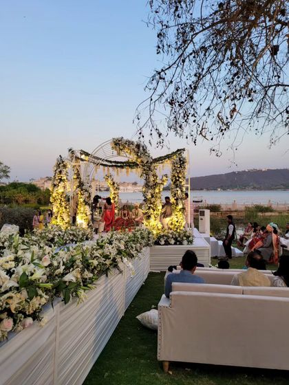 The beautiful setup for a lakeside wedding ceremony. We have choreographed dances for some of the most scenic and luxurious wedding locations.
