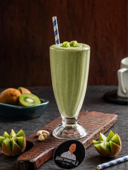 A refreshing kiwi milkshake, with its natural green color and simple styling.