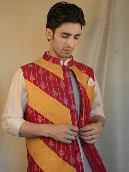 The regal charm of a traditional bandhgala is elevated with our unique fabric selection and meticulous tailoring.