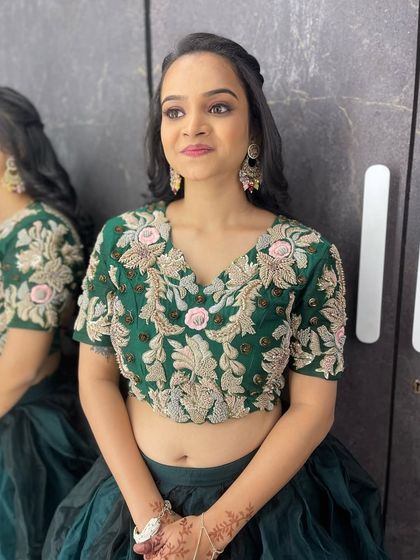 A portrait of the sister of the bride. Her smokey eye and pink lip are a perfect combination for the festive occasion.