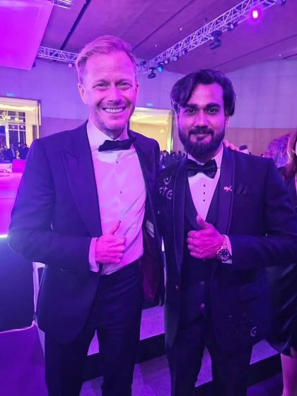 Sharing a moment with another guest at the Keune celebration. The energy at these milestone events is always incredible.