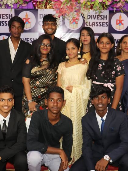 A lovely group photo of students and teachers, capturing the diversity and unity of our Divesh Classes family.