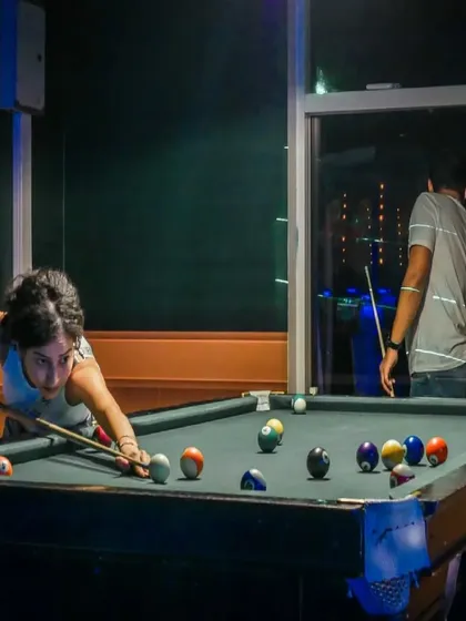 Need a break from the dance floor? I've got a pool table ready for you. It's a great way to chill with a beer, challenge your friends, and watch the action unfold.