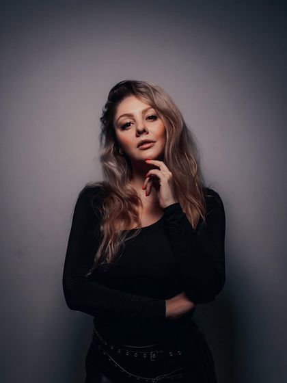 A clean, professional headshot used for an event flyer in Indore. A good press photo is essential for any touring DJ and producer.