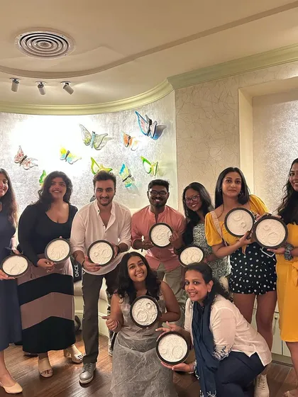 A group proudly displays their Zen garden creations. Another unique and mindful workshop we offer.