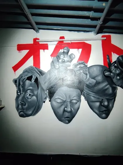 The 'STATES OF MIND' mural shown in its entirety within the room. The spotlighting was planned to create a dramatic, gallery-like effect.