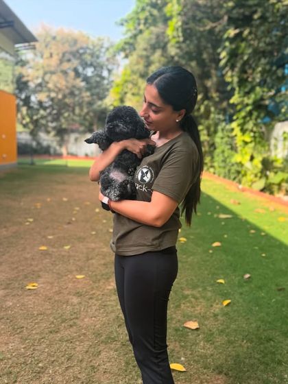 Holding Mango up to the sky. She's our little superstar.