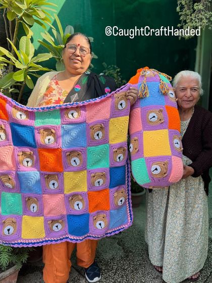 Our dadi-poti team proudly presenting a colorful bear-themed baby blanket and a matching bolster pillow. This set is perfect for a complete nursery look.