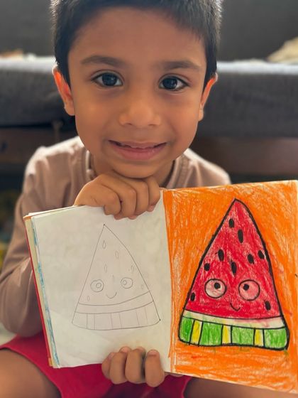 Another sweet watermelon drawing by a junior KG student, this time with a bright orange background. I encourage kids to experiment with colour combinations to make their artwork unique.