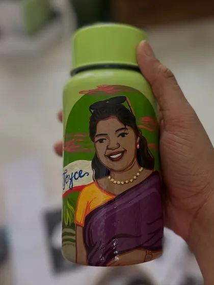 Another custom-painted bottle for Mother's Day, personalized with a portrait and name.