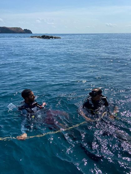 Moments from our Andaman dive trips, showing everything from gearing up at the dive center to relaxing on the boat between dives.