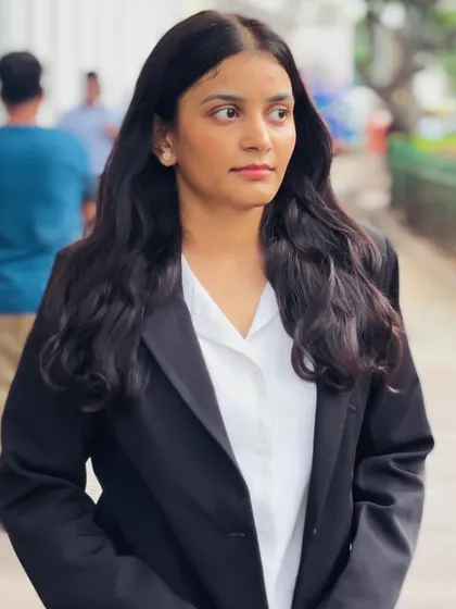 A focused, determined look. Freedom isn't free, and defending it in court requires dedication and strength.