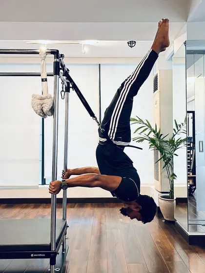 Defy your limits and discover your strength. An inversion like this on the Cadillac requires a powerful core and complete body awareness. I will help you build that foundation, one step at a time, so you can achieve things you never thought possible.