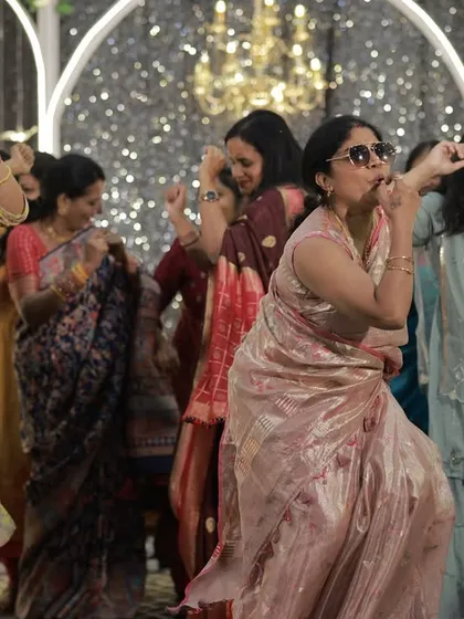 My promise is to get everyone on the dance floor, even the shy uncles and aunties. Seeing guests enjoy themselves like this is the best part of my job as a sangeet DJ.