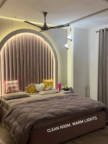 This is my dopamine recipe. A clean room with warm lights, cozy pillows, and my favorite things create a calming vibe that helps me unwind from the daily chaos.