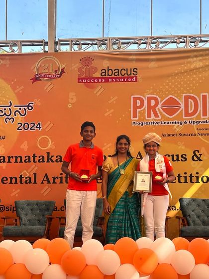 Two of our students celebrating their success at the regional mental arithmetic competition. It's wonderful to see them support each other.