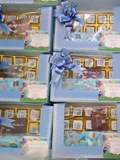 Another shot of the Cocomelon first birthday hampers, showing the consistent and neat packaging for a bulk order.
