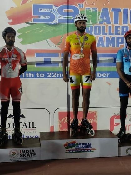 Standing on the podium at the 59th National Roller Skating Championship.