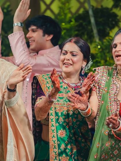 A close-up of the family's joy during the finale. Our choreography for large family groups focuses on simple, fun steps that allow everyone's personality to shine.