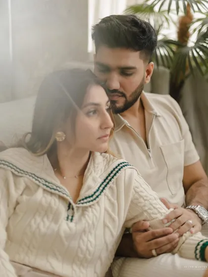 A pensive, gentle embrace. We use soft, hazy light to create a dreamy and romantic mood for our indoor couple photoshoots.