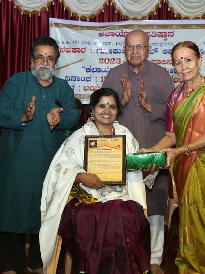 A candid shot from the Kalayogi award ceremony. The joy is not just in receiving the award, but in being surrounded by the stalwarts of the art world.