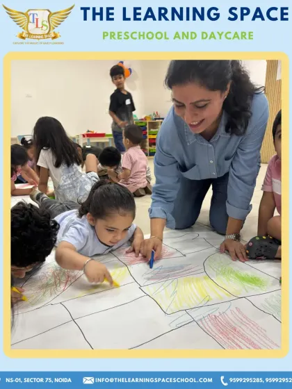 A teacher guides a child during the map coloring activity. I ensure that every child receives individual attention, helping them learn and participate with confidence.