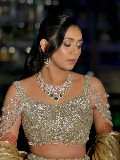 A close-up of the Sangeet makeup. I used a soft, shimmery gold and brown eyeshadow look with a winged liner to create a glamorous, eye-catching effect.